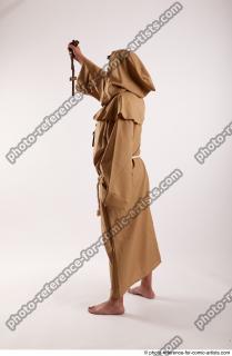 JOEL_ADAMSON MONK WITH CRUCIFIX